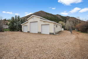 Detached garage with a mountain view