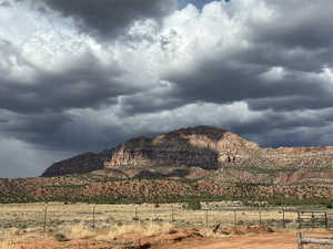 Property view of mountains featuring a rural view