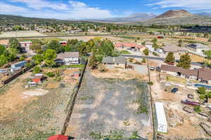 Aerial view featuring a mountain view and a residential view