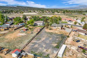 Drone / aerial view featuring a mountain view and a residential view
