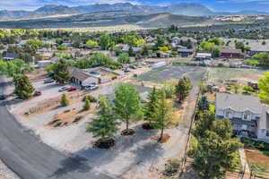 Aerial view featuring a mountain view and a residential view