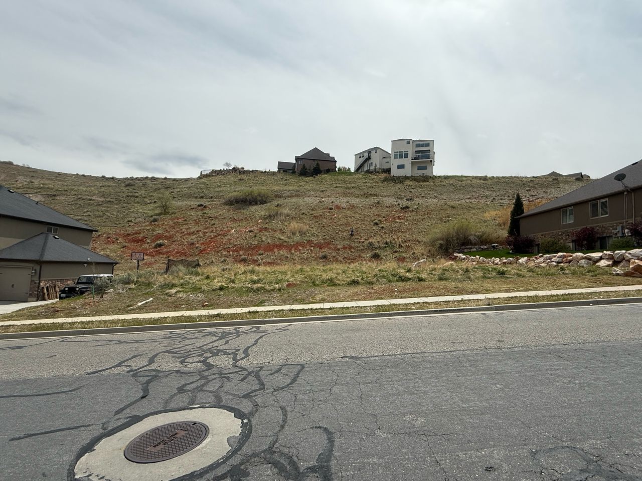 View of road with curbs and sidewalks