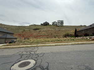 View of road with curbs and sidewalks