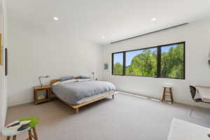 Bedroom featuring carpet and recessed lighting