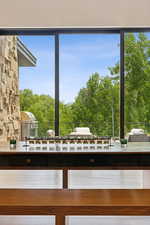 View of patio / terrace featuring an outdoor kitchen and view of scattered trees