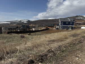 View of yard with a mountain view