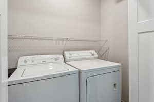 Laundry area with washer and dryer and laundry area