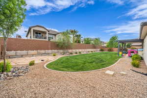 View of yard featuring a patio and a fenced backyard