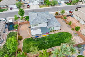 Birds eye view of property with a residential view