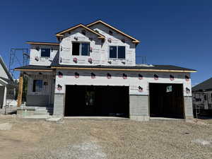 Property under construction featuring driveway