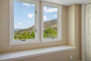 Room details featuring a mountain view