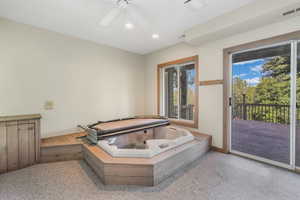Bathroom featuring a ceiling fan, recessed lighting, and visible vents