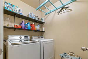 Clothes washing area with washer and dryer and laundry area