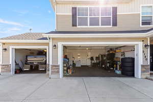 Garage with concrete driveway