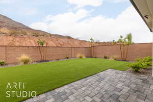 View of yard with a patio area