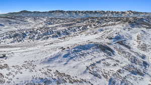Snowy aerial view with a mountain view