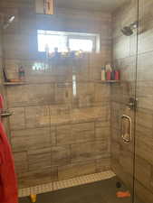 Full bath featuring a stall shower