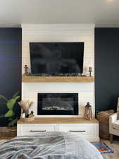 Room details featuring a large fireplace