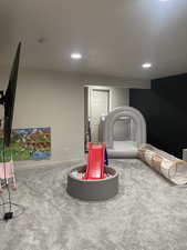 Rec room with carpet, baseboards, and recessed lighting