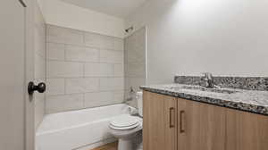 Bathroom with toilet, shower / bathtub combination, vanity, and wood finished floors