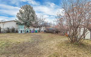 View of yard with fence