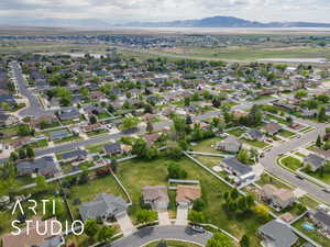 Aerial view featuring a mountain view and a residential view