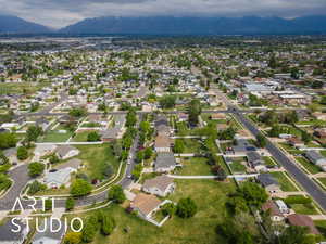 Birds eye view of property featuring a mountain view and a residential view