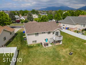 Drone / aerial view with a mountain view and a residential view