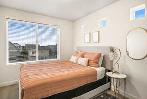Bedroom with baseboards