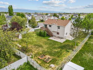 Birds eye view of property with a residential view