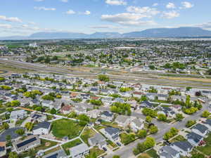 Birds eye view of property featuring a mountain view and a residential view