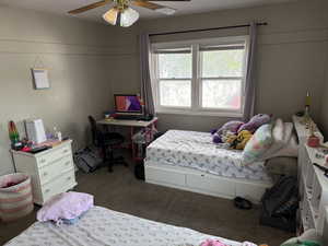 Bedroom featuring carpet flooring and ceiling fan