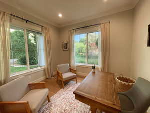 Office featuring baseboards, recessed lighting, and wood finished floors