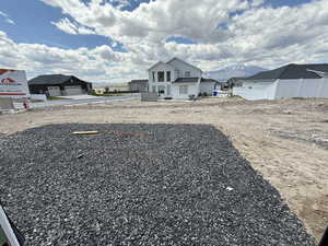 View of yard featuring fence