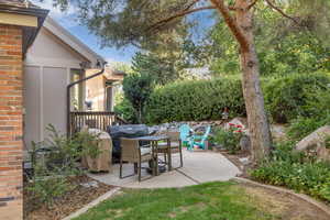 View of patio featuring area for grilling