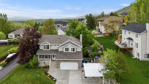 Aerial view of residential area featuring mountains