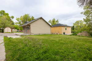 View of side of property with a patio