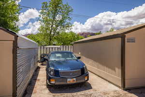 View of parking featuring fence