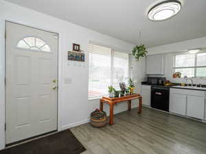 Kitchen with side garage door.