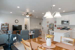 Dining room featuring recessed lighting, light wood-style floors, and ceiling fan