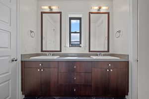 Bathroom with double vanity and a sink