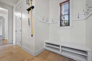 Mudroom featuring baseboards