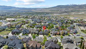 Drone / aerial view with a mountain view and a residential view
