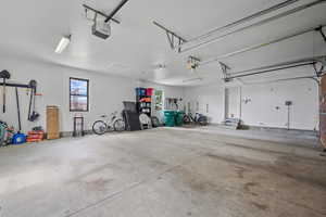 Garage featuring a garage door opener