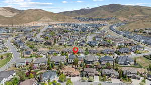 Drone / aerial view featuring a mountain view and a residential view