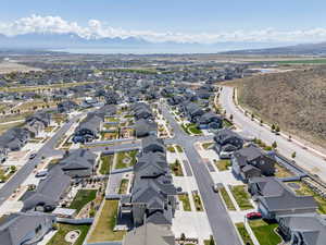 Drone / aerial view featuring a mountain view and a residential view