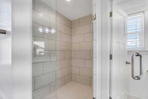 Bathroom with a tile shower