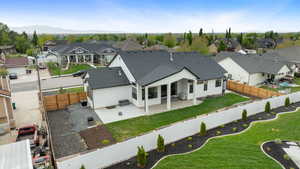 Drone / aerial view featuring a mountain view and a residential view