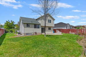 Back of house featuring a patio and a gazebo