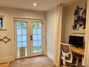 Doorway with visible vents, french doors, baseboards, and recessed lighting